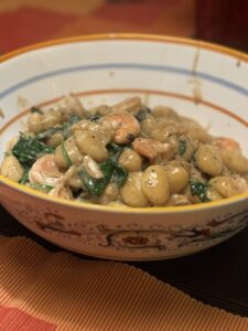 sun-dried tomato gnocchi with spinach and shrimp